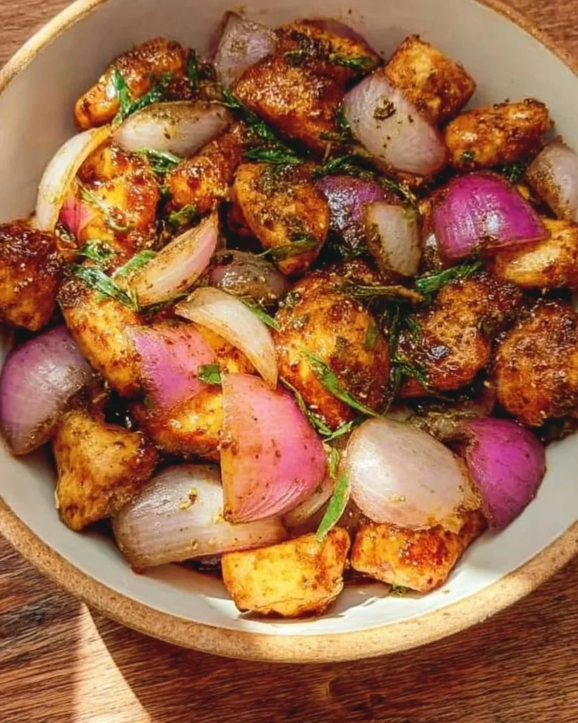 Chicken with onions recipe featuring tender chicken pieces and savory onions